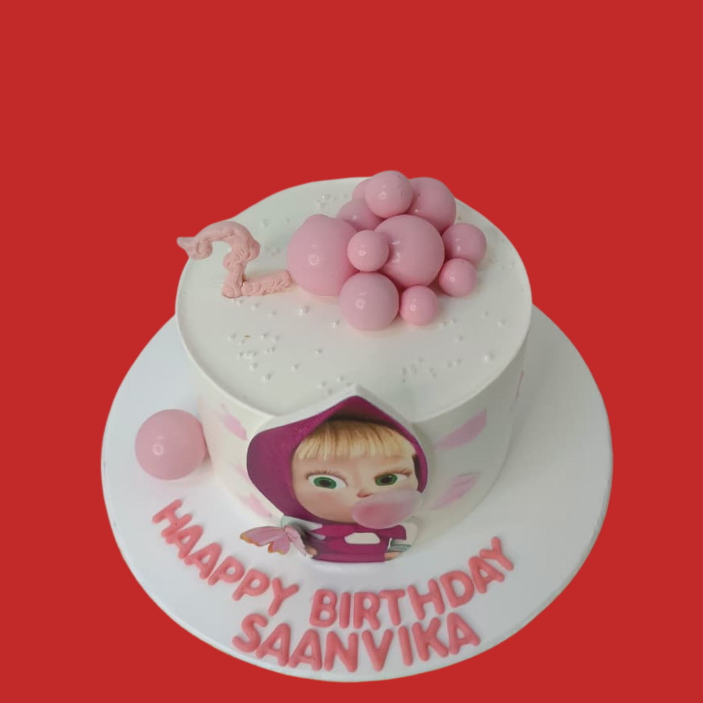 Bear-themed birthday cake.